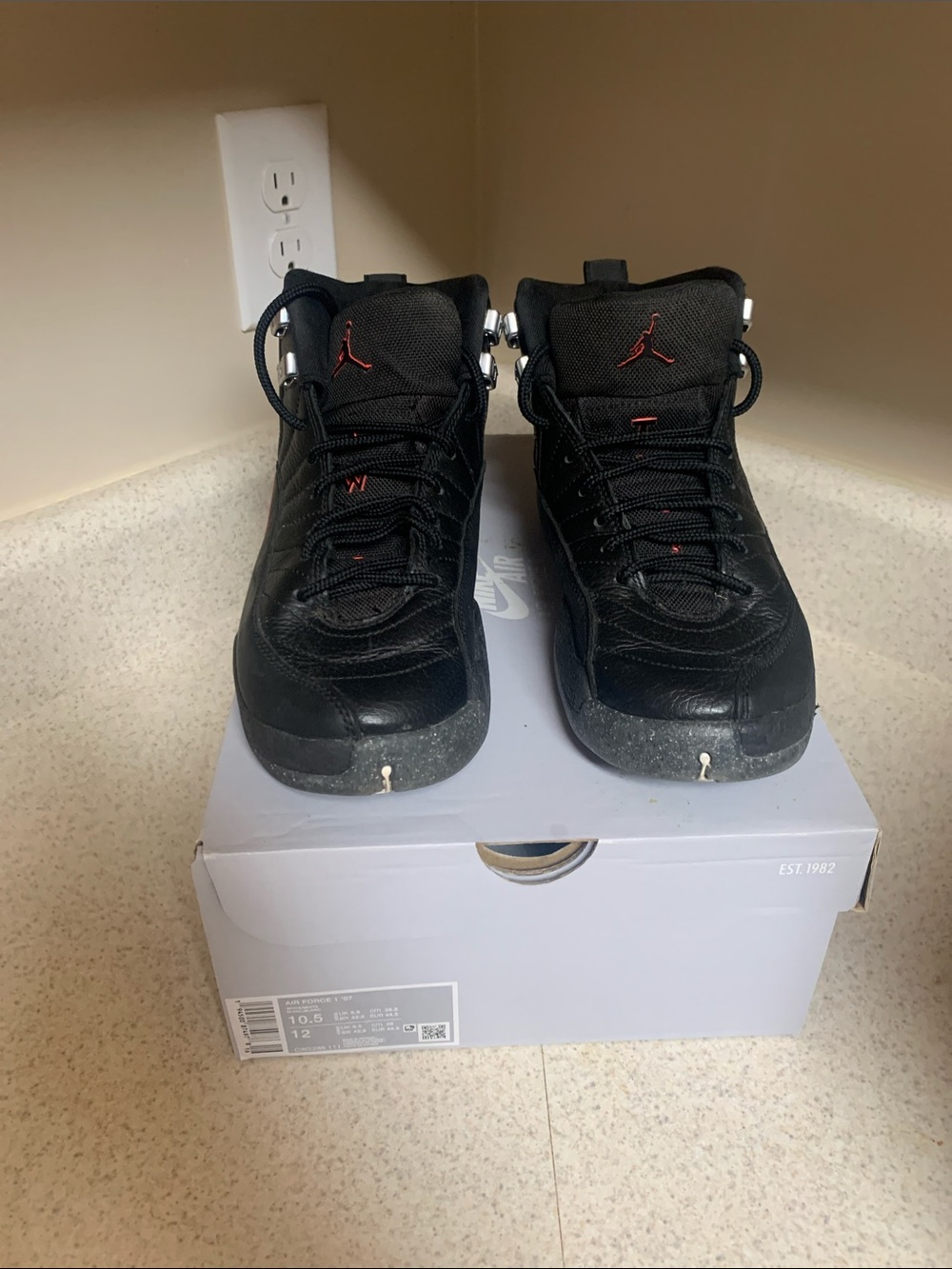 Jordan Black Sneakers with Red Jumpman Accents